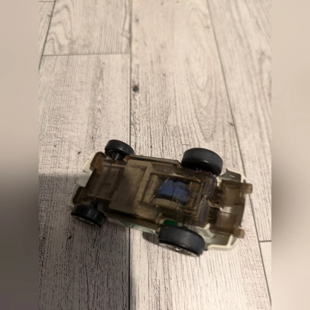 White and Green Polizei Friccion Toy Car